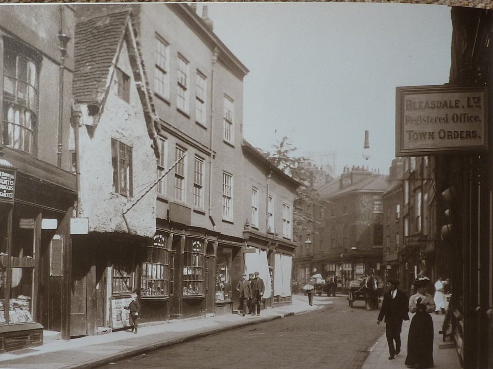 Barnitts on the right with the baskets hanging down. Horse and cart delivery