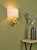 Raul Monkey Wall Light Gold C/W Natural Linen Shade